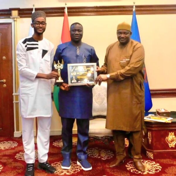 President Barrow receiving his award at State House