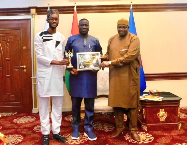 President Barrow receiving his award at State House